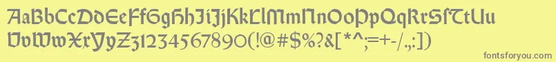 RundgotischRegular-fontti – harmaat kirjasimet keltaisella taustalla