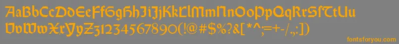 RundgotischRegular-fontti – oranssit fontit harmaalla taustalla