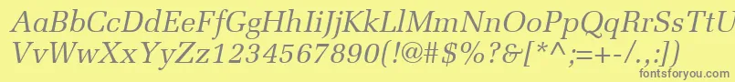 フォントMeliorLtItalic – 黄色の背景に灰色の文字