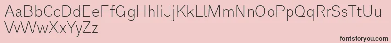 フォントAnalogue35thin – ピンクの背景に黒い文字