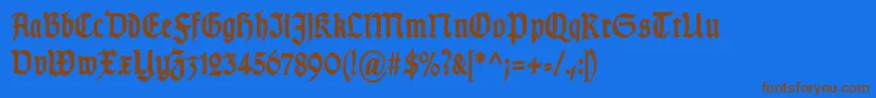 Шрифт TypographergotischSchmalBold – коричневые шрифты на синем фоне