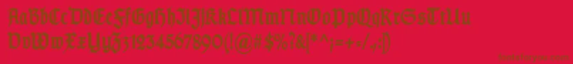 TypographergotischSchmalBold-Schriftart – Braune Schriften auf rotem Hintergrund