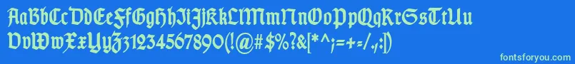 Fonte TypographergotischSchmalBold – fontes verdes em um fundo azul