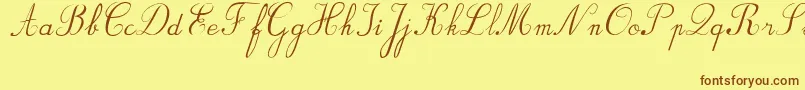フォントBvRondesItal – 茶色の文字が黄色の背景にあります。