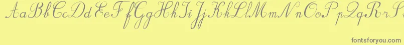 BvRondesItal-fontti – harmaat kirjasimet keltaisella taustalla