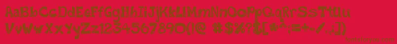 SmileyFont-Schriftart – Braune Schriften auf rotem Hintergrund