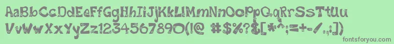 Czcionka SmileyFont – szare czcionki na zielonym tle