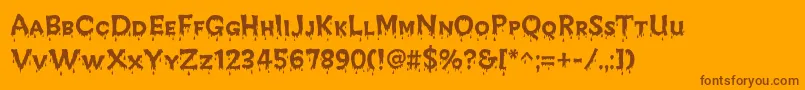 CreepyRegular-Schriftart – Braune Schriften auf orangefarbenem Hintergrund