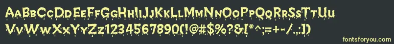 CreepyRegular-Schriftart – Gelbe Schriften auf schwarzem Hintergrund