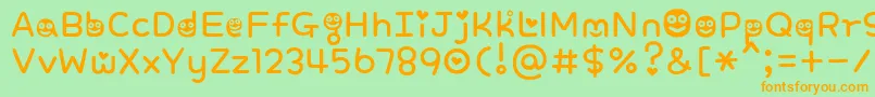 SweetSmile Font – Orange Fonts on Green Background