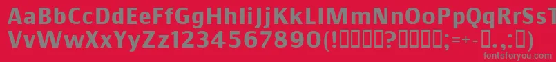フォントCommsb – 赤い背景に灰色の文字