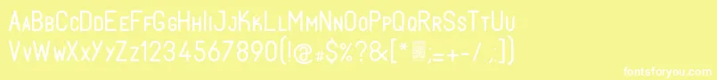 フォントFabiolosmallcapRegular – 黄色い背景に白い文字
