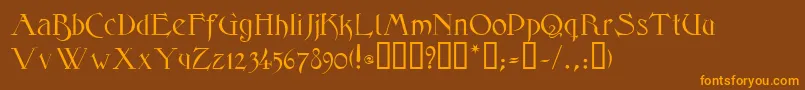 フォントElphinstoneTM – オレンジ色の文字が茶色の背景にあります。