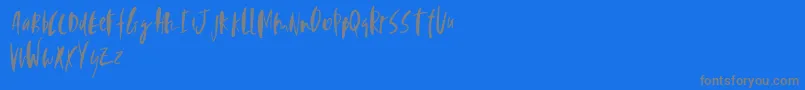 フォントPerfecta – 青い背景に灰色の文字