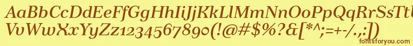 TusartextosfItalic-Schriftart – Braune Schriften auf gelbem Hintergrund