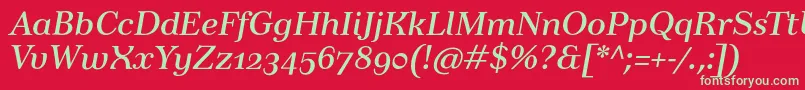 TusartextosfItalic-Schriftart – Grüne Schriften auf rotem Hintergrund