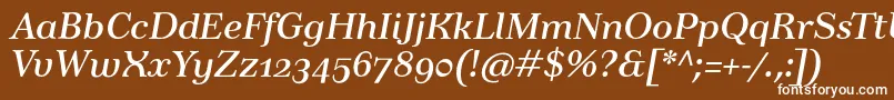 フォントTusartextosfItalic – 茶色の背景に白い文字
