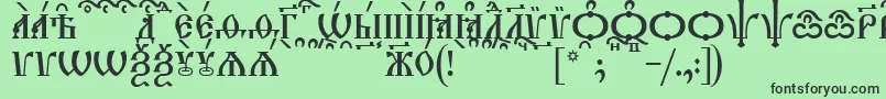 Czcionka TriodionCapsKucs – czarne czcionki na zielonym tle