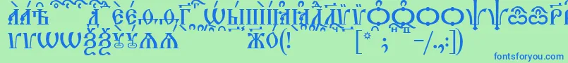TriodionCapsKucs Font – Blue Fonts on Green Background
