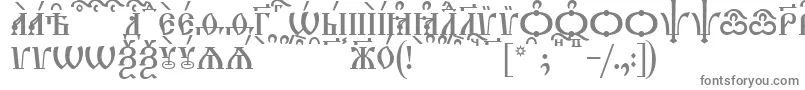 TriodionCapsKucs-fontti – harmaat kirjasimet valkoisella taustalla