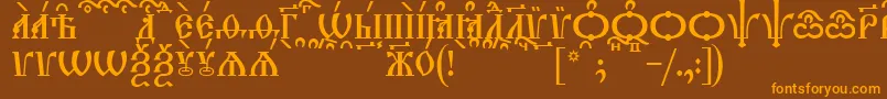 TriodionCapsKucs Font – Orange Fonts on Brown Background