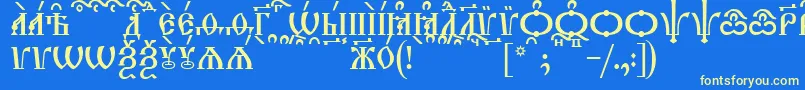 TriodionCapsKucs Font – Yellow Fonts on Blue Background