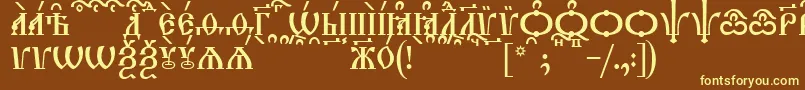 TriodionCapsKucs-Schriftart – Gelbe Schriften auf braunem Hintergrund