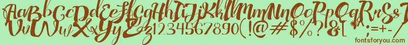 AdefebiaFreeFont-fontti – ruskeat fontit vihreällä taustalla
