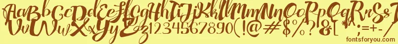 AdefebiaFreeFont Font – Brown Fonts on Yellow Background