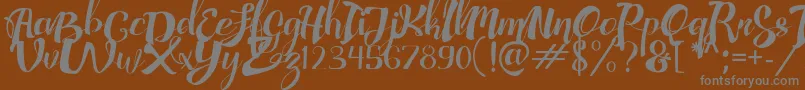 Шрифт AdefebiaFreeFont – серые шрифты на коричневом фоне