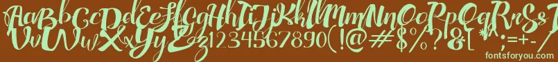AdefebiaFreeFont Font – Green Fonts on Brown Background