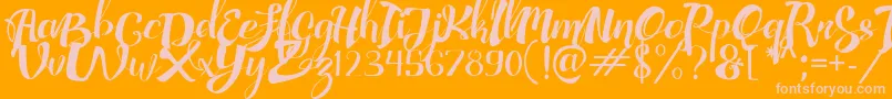 AdefebiaFreeFont-fontti – vaaleanpunaiset fontit oranssilla taustalla