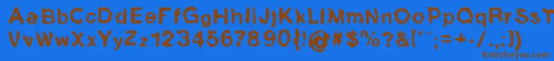 フォントHucris – 茶色の文字が青い背景にあります。