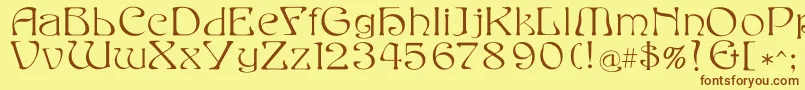 フォントEddafilled – 茶色の文字が黄色の背景にあります。