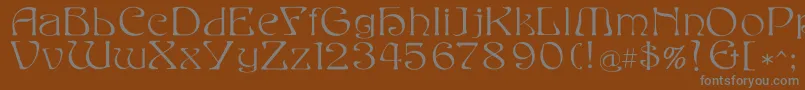 Eddafilled-fontti – harmaat kirjasimet ruskealla taustalla