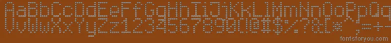 Czcionka EnhancedLedBoard7 – szare czcionki na brązowym tle