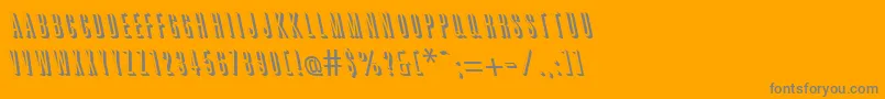 GreatshadowbackslantRegular-Schriftart – Graue Schriften auf orangefarbenem Hintergrund