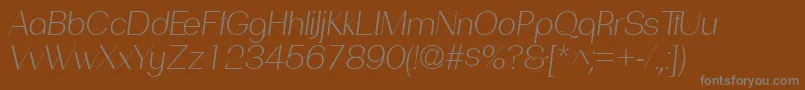 PassionsanspdadLightitalic-Schriftart – Graue Schriften auf braunem Hintergrund