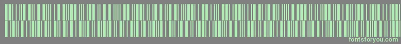 フォントIntp24dltt – 灰色の背景に緑のフォント