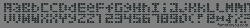 フォントGreaseballs – 黒い文字の灰色の背景