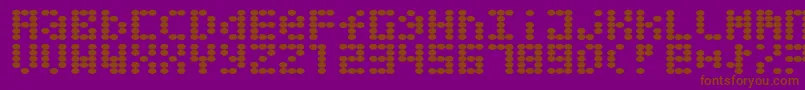 Greaseballs-fontti – ruskeat fontit violetilla taustalla