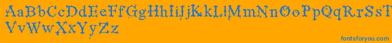 VtksBlackLabelNormal-Schriftart – Blaue Schriften auf orangefarbenem Hintergrund