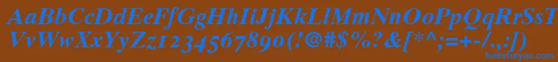 Czcionka GrecoTenOldstyleSsiBold – niebieskie czcionki na brązowym tle