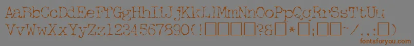 Fonte FifthcopysskRegular – fontes marrons em um fundo cinza