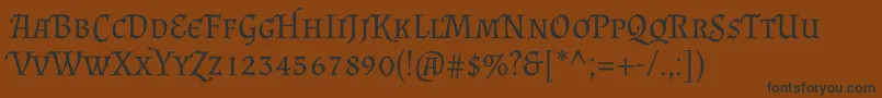 AlmendrascRegular Font – Black Fonts on Brown Background