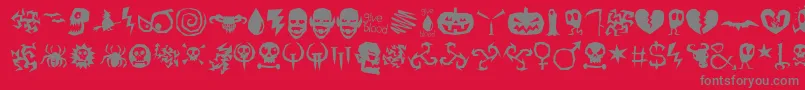 IllOctober-fontti – harmaat kirjasimet punaisella taustalla