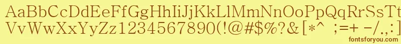 フォントBatang – 茶色の文字が黄色の背景にあります。