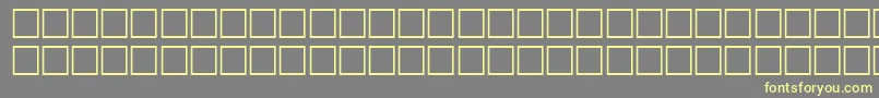 TrkQuraan Font – Yellow Fonts on Gray Background