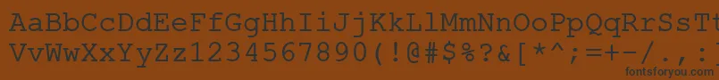 Czcionka ErKurier866 – czarne czcionki na brązowym tle