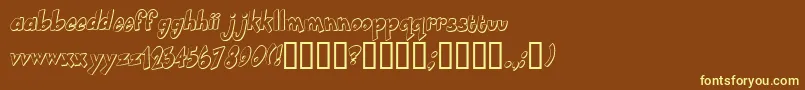 Smartie-fontti – keltaiset fontit ruskealla taustalla